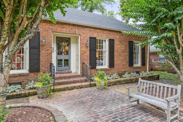 215 Belhaven St, Memphis, TN 38117 - entrance to property with brick siding and roof with shingles