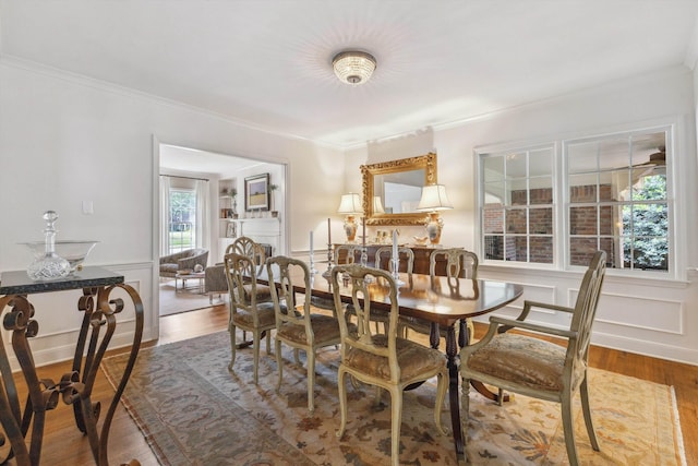 215 Belhaven St, Memphis, TN 38117 - dining room with ornamental molding, wood finished floors, and wainscoting