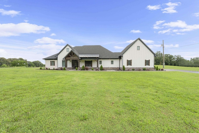 2295 Tomlin Rd, Somerville, TN 38068 - modern inspired farmhouse with board and batten siding and a front lawn