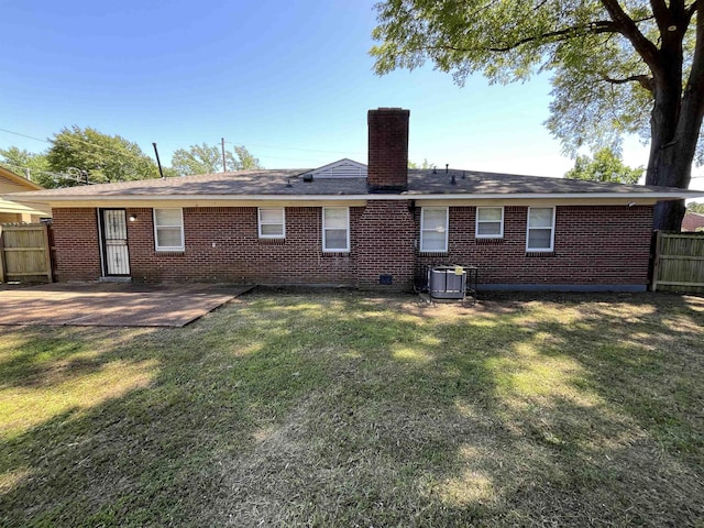 4080 Northbridge Ave, Memphis, TN 38118 - rear view of property featuring a chimney, brick siding, and a patio