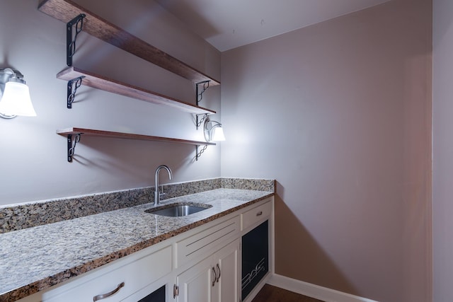 2030 Quail Creek Cv, Memphis, TN 38119 - kitchen with open shelves, white cabinets, and light stone counters