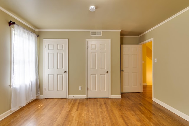 2030 Quail Creek Cv, Memphis, TN 38119 - unfurnished bedroom with light wood finished floors and crown molding
