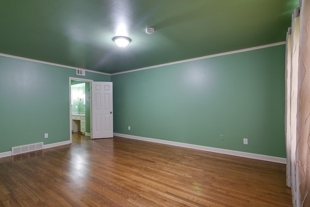2030 Quail Creek Cv, Memphis, TN 38119 - empty room with a smoke detector, ornamental molding, and wood finished floors