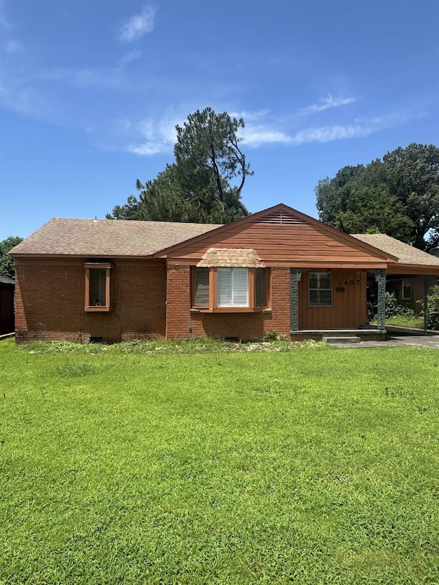 1407 Worthington St, Memphis, TN 38114 - single story home featuring a front yard and brick siding