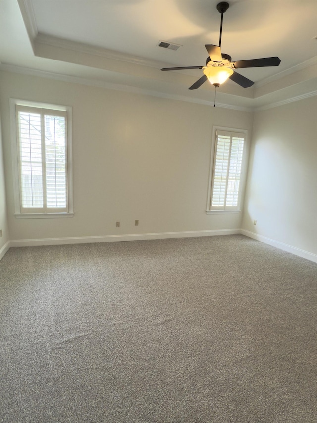 3485 E Taplow Way E, Collierville, TN 38017 - empty room with a raised ceiling, ornamental molding, a ceiling fan, and carpet floors