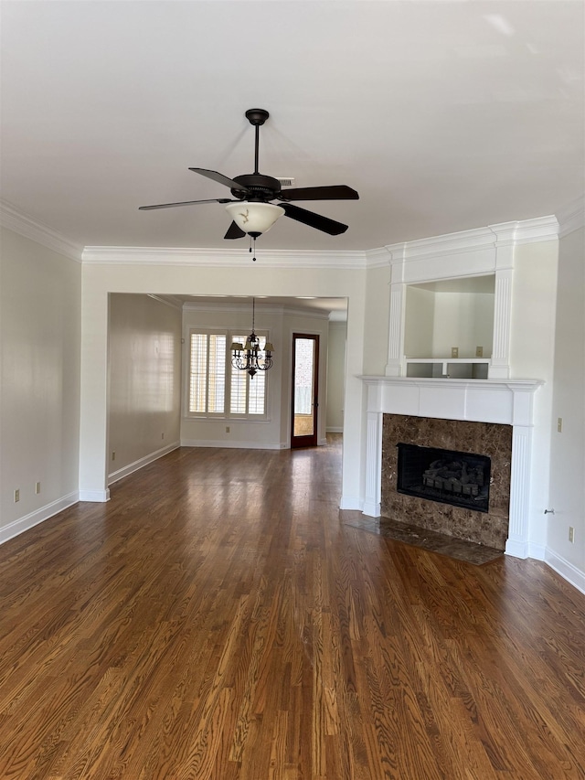 3485 E Taplow Way E, Collierville, TN 38017 - unfurnished living room featuring a chandelier, crown molding, a fireplace, a ceiling fan, and dark wood finished floors