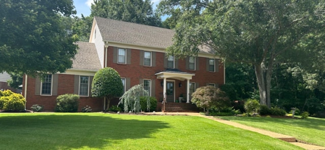 7802 Foster Ridge Dr, Germantown, TN 38138 - view of front of home featuring a front lawn and brick siding