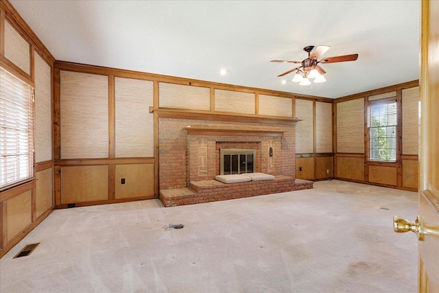 7802 Foster Ridge Dr, Germantown, TN 38138 - unfurnished living room with ceiling fan, light carpet, wainscoting, and a fireplace