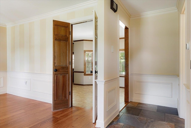 7802 Foster Ridge Dr, Germantown, TN 38138 - hallway featuring crown molding, wainscoting, wood finished floors, and wallpapered walls