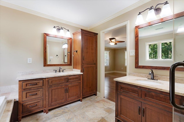 7802 Foster Ridge Dr, Germantown, TN 38138 - bathroom with two vanities, crown molding, healthy amount of natural light, and ceiling fan