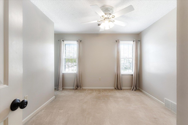 7802 Foster Ridge Dr, Germantown, TN 38138 - empty room featuring a textured ceiling, carpet, and ceiling fan