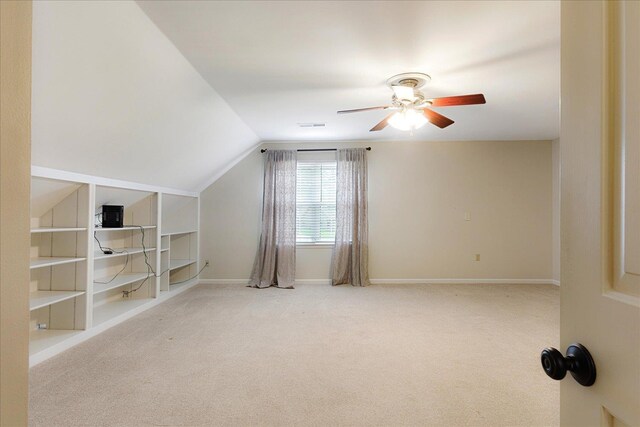 7802 Foster Ridge Dr, Germantown, TN 38138 - additional living space with carpet, a ceiling fan, lofted ceiling, and built in shelves