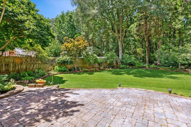 7802 Foster Ridge Dr, Germantown, TN 38138 - fenced backyard featuring a patio area