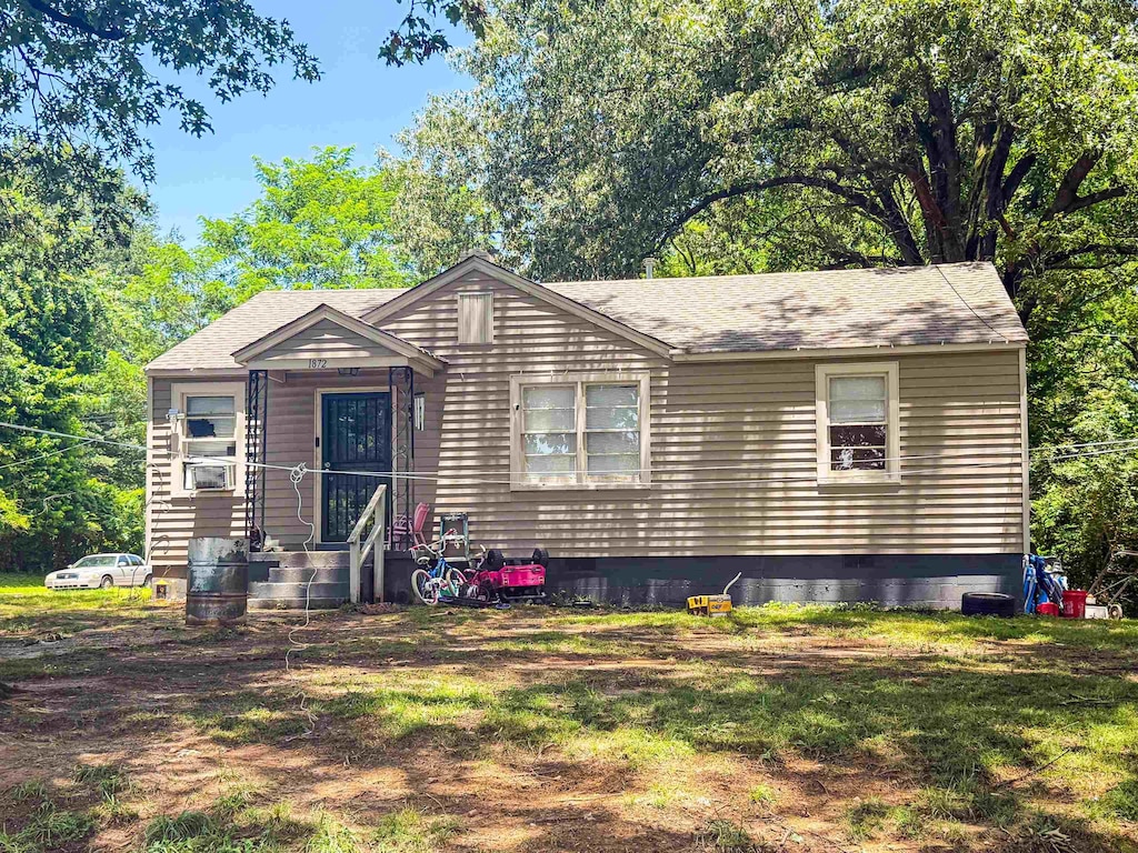 1872 Portland Ave, Memphis, TN 38127 - view of front of home with crawl space and a shingled roof