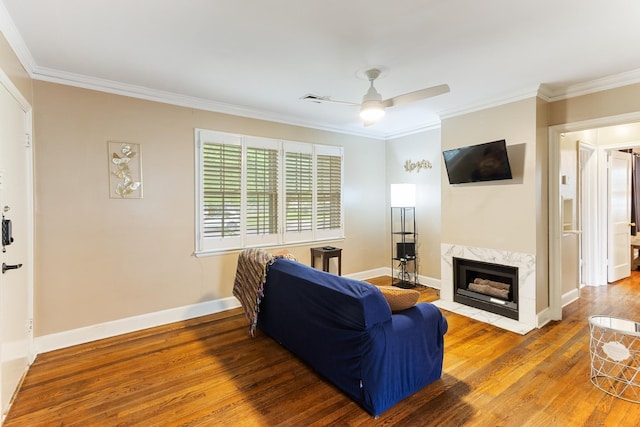 3541 Aurora Cir, Memphis, TN 38111 - living area with hardwood / wood-style flooring, crown molding, a high end fireplace, and ceiling fan