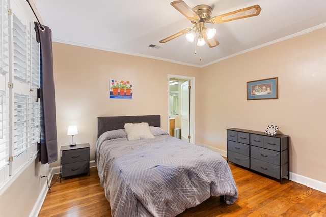 3541 Aurora Cir, Memphis, TN 38111 - bedroom with wood finished floors, crown molding, ceiling fan, and ensuite bathroom