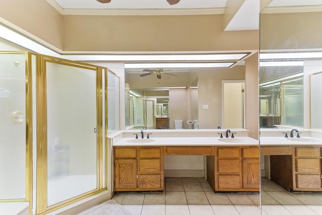 3541 Aurora Cir, Memphis, TN 38111 - bathroom with a ceiling fan, a shower stall, double vanity, and ornamental molding