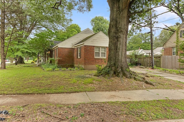 3541 Aurora Cir, Memphis, TN 38111 - view of side of property with brick siding