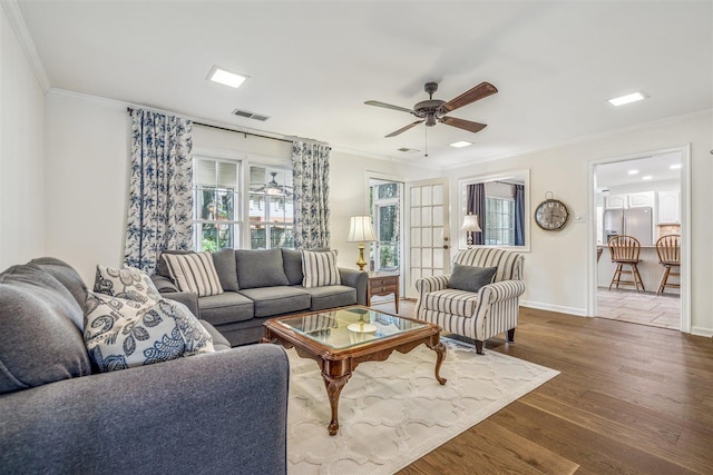 2108 Prestwick Dr, Germantown, TN 38139 - living room featuring dark wood finished floors, ornamental molding, and ceiling fan