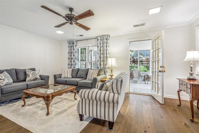 2108 Prestwick Dr, Germantown, TN 38139 - living room featuring wood finished floors, ceiling fan, and crown molding