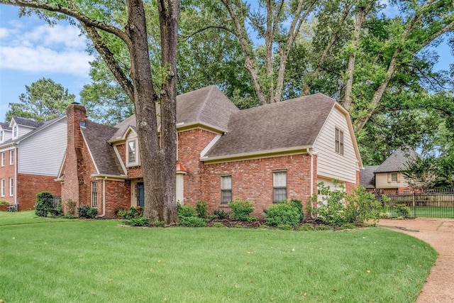 2108 Prestwick Dr, Germantown, TN 38139 - view of front of house with brick siding, roof with shingles, and a chimney