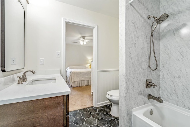 2108 Prestwick Dr, Germantown, TN 38139 - bathroom with vanity, shower / bathtub combination, wainscoting, ensuite bathroom, and ceiling fan