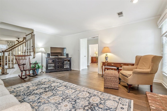 2108 Prestwick Dr, Germantown, TN 38139 - living area with wood finished floors, ornamental molding, and stairs