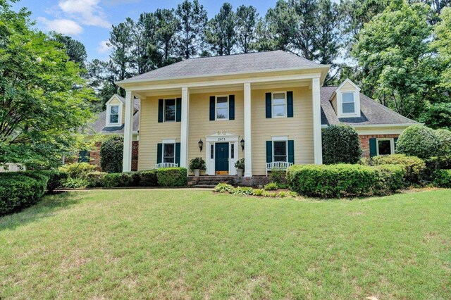 2671 Maple Grove Cv S, Germantown, TN 38139 - neoclassical home with covered porch and a front yard