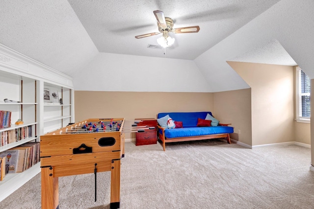 2671 Maple Grove Cv S, Germantown, TN 38139 - rec room with carpet, vaulted ceiling, a textured ceiling, and a ceiling fan