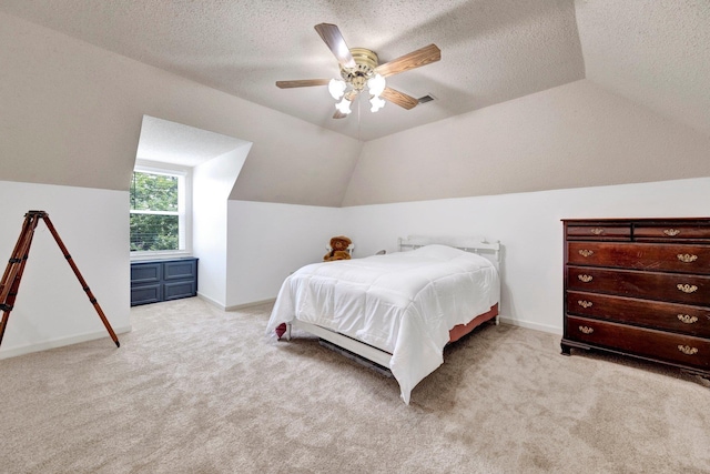 2671 Maple Grove Cv S, Germantown, TN 38139 - bedroom with vaulted ceiling, light colored carpet, a textured ceiling, and ceiling fan