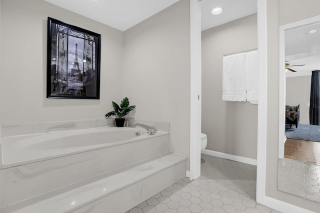 200 Wagner Pl Unit 804, Memphis, TN 38103 - bathroom featuring a garden tub, a ceiling fan, tile patterned floors, and recessed lighting