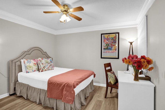 200 Wagner Pl Unit 804, Memphis, TN 38103 - bedroom featuring light wood finished floors, ornamental molding, and a ceiling fan