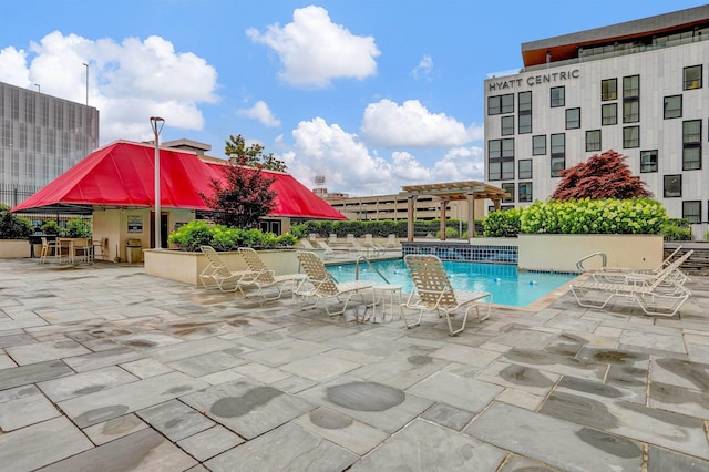 200 Wagner Pl Unit 804, Memphis, TN 38103 - community pool with a patio and a pergola