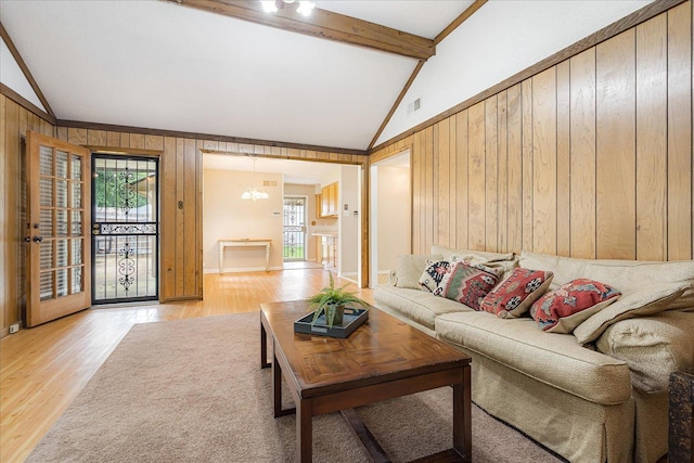3333 Sycamore View Rd, Bartlett, TN 38134 - living area with light wood-style floors and wooden walls