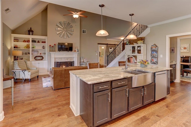 280 Cotton Trail Dr, Rossville, TN 38066 - kitchen with a ceiling fan, light wood-style floors, dishwasher, a lit fireplace, and high vaulted ceiling