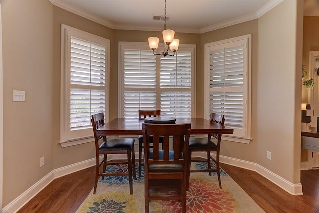 280 Cotton Trail Dr, Rossville, TN 38066 - dining area featuring a chandelier, wood finished floors, and crown molding
