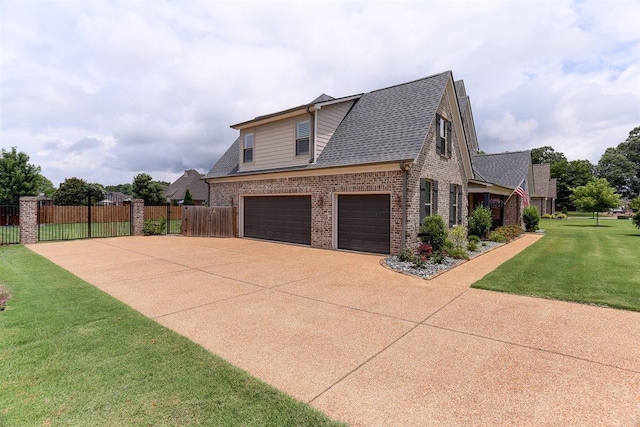 280 Cotton Trail Dr, Rossville, TN 38066 - view of property exterior with brick siding, driveway, a shingled roof, and an attached garage