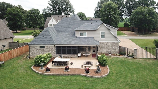 280 Cotton Trail Dr, Rossville, TN 38066 - back of house with a fire pit, brick siding, a patio area, a gate, and a fenced backyard