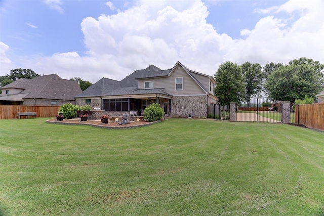 280 Cotton Trail Dr, Rossville, TN 38066 - back of house with brick siding, a patio area, and a fenced backyard