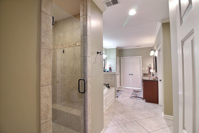 774 Wellington Way Cv, Collierville, TN 38017 - full bathroom featuring a shower stall, vanity, a garden tub, ornamental molding, and tile patterned flooring