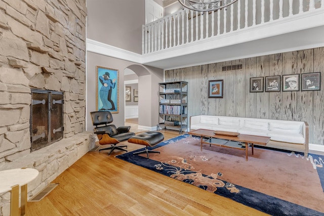 2004 Kirby Rd, Memphis, TN 38119 - living room featuring a towering ceiling, arched walkways, and wood finished floors