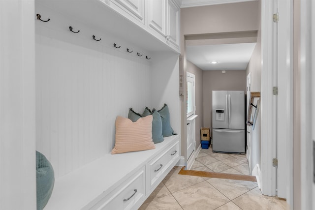 2004 Kirby Rd, Memphis, TN 38119 - mudroom featuring baseboards and light tile patterned floors