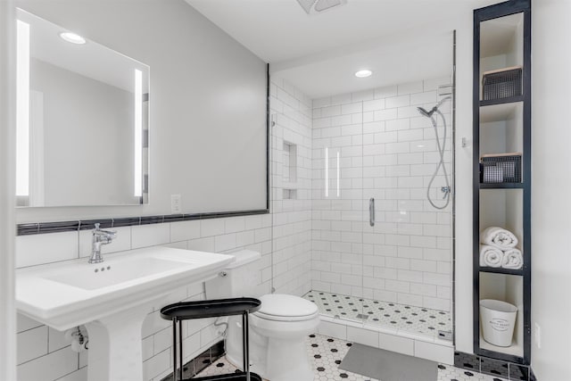 2004 Kirby Rd, Memphis, TN 38119 - full bath featuring a stall shower, recessed lighting, and tile walls