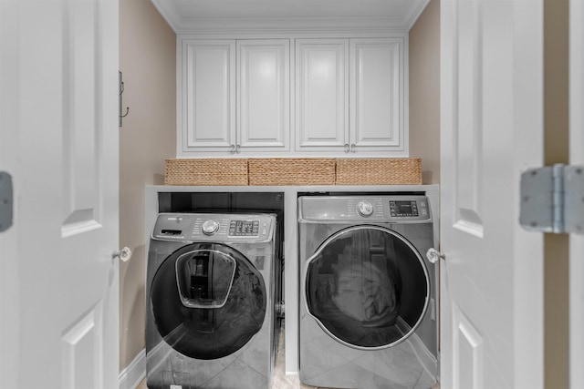 2004 Kirby Rd, Memphis, TN 38119 - laundry room with washing machine and clothes dryer, cabinet space, and crown molding