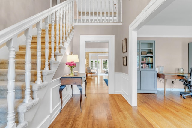 2004 Kirby Rd, Memphis, TN 38119 - foyer with wood finished floors, stairs, wainscoting, and ornamental molding
