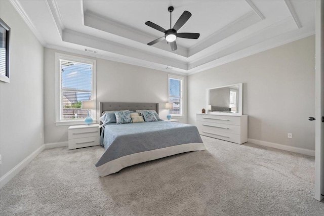 4741 Carousel Ln, Collierville, TN 38017 - carpeted bedroom with a tray ceiling, ornamental molding, and ceiling fan