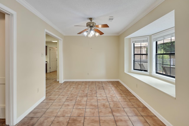 460 Jason Dr, Memphis, TN 38120 - spare room with ornamental molding, ceiling fan, a textured ceiling, and light tile patterned floors