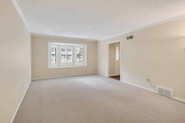 460 Jason Dr, Memphis, TN 38120 - empty room featuring ornamental molding, carpet flooring, and a textured ceiling