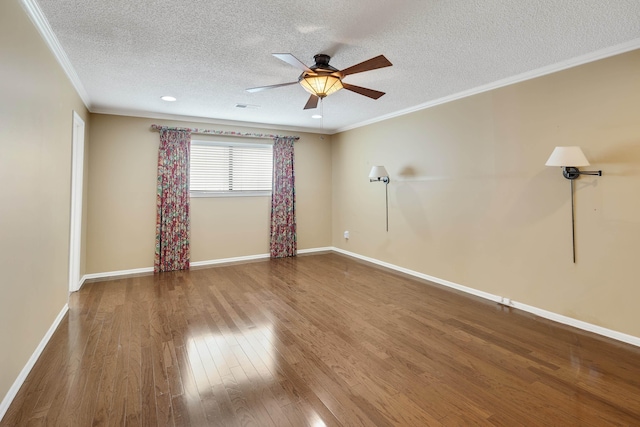 460 Jason Dr, Memphis, TN 38120 - empty room featuring a textured ceiling, wood finished floors, crown molding, and ceiling fan