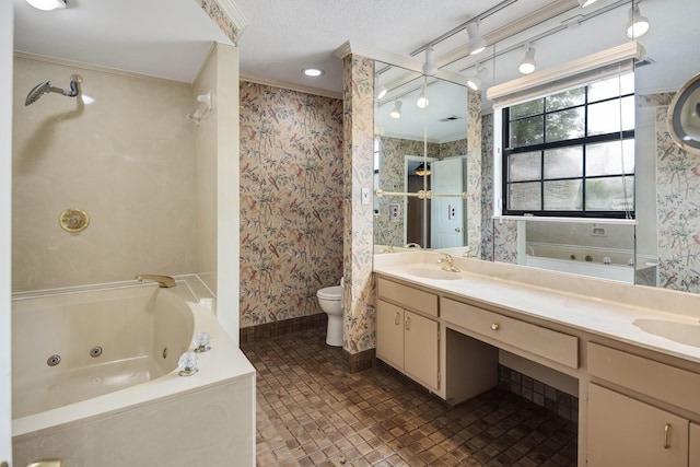 460 Jason Dr, Memphis, TN 38120 - full bathroom with double vanity, a whirlpool tub, wallpapered walls, ornamental molding, and a textured ceiling